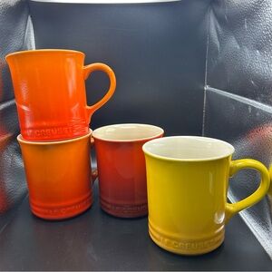 Le Creuset Set Of 4 Mugs 14 Oz. 1 Red 1 Yellow 2 Orange Nice Set